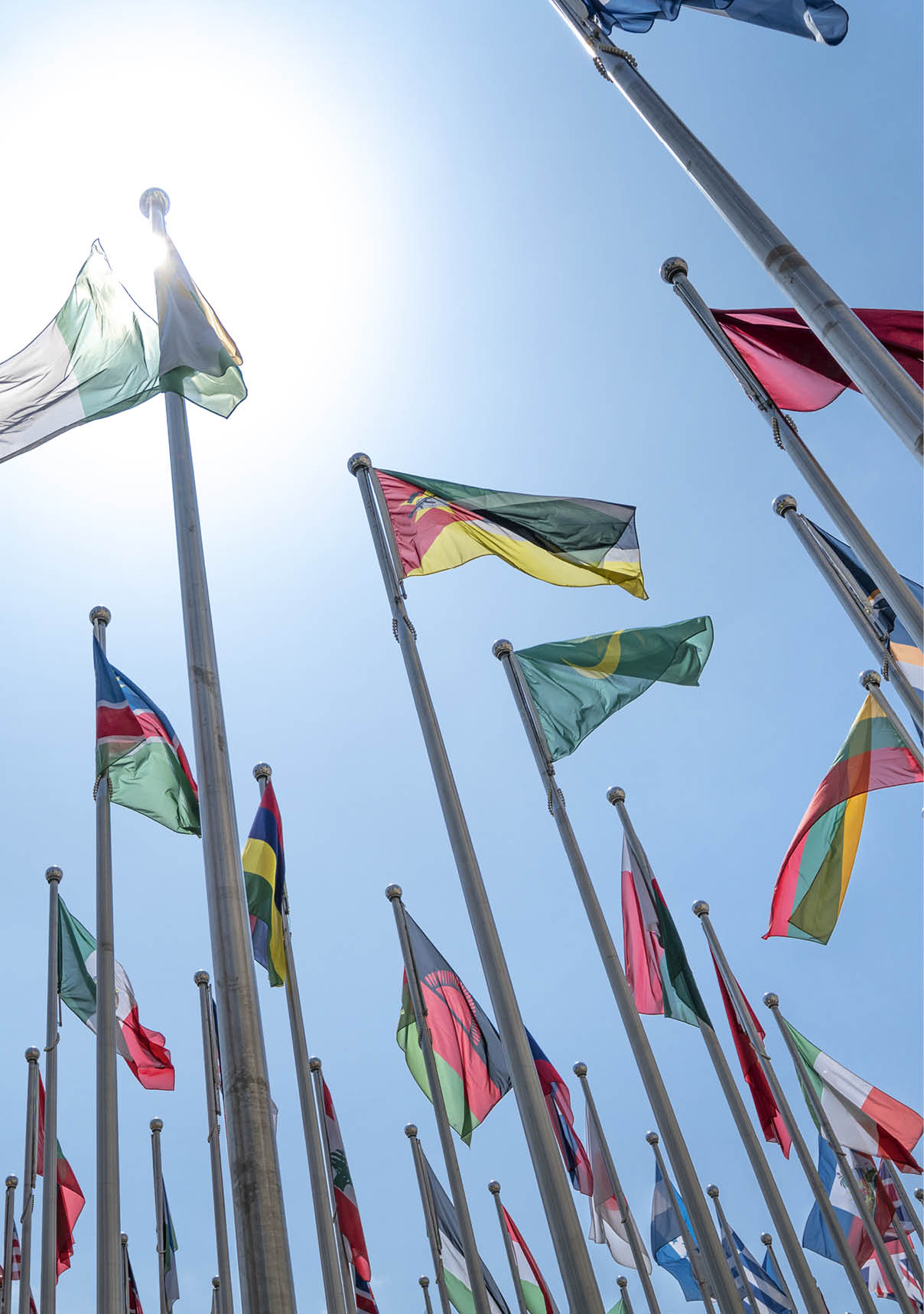 Shanghai, China - April 16, 2019. Various Flags Fluttering with Wind Under Blue Sky